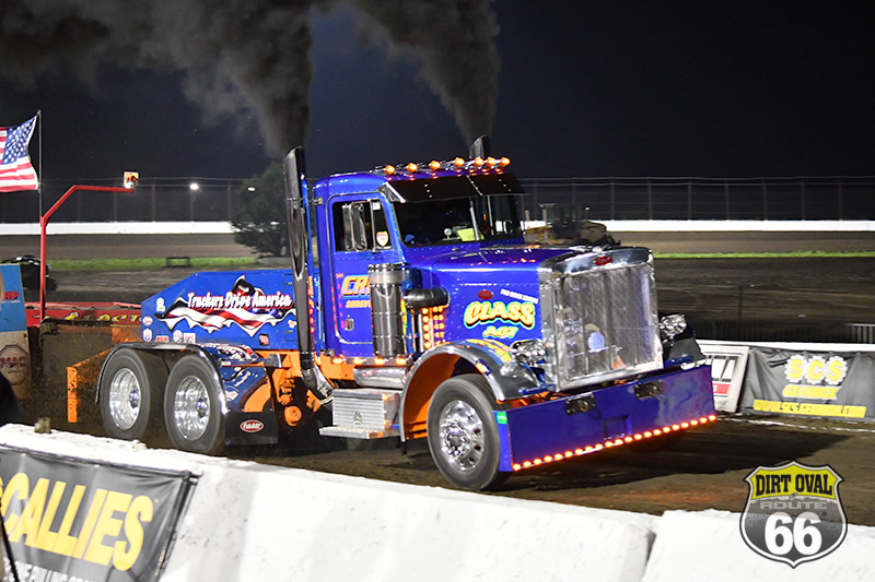 semi-truck pulling sled