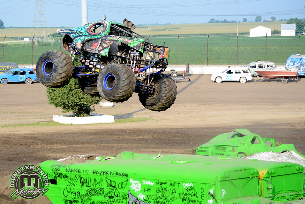 monster truck jumping buses